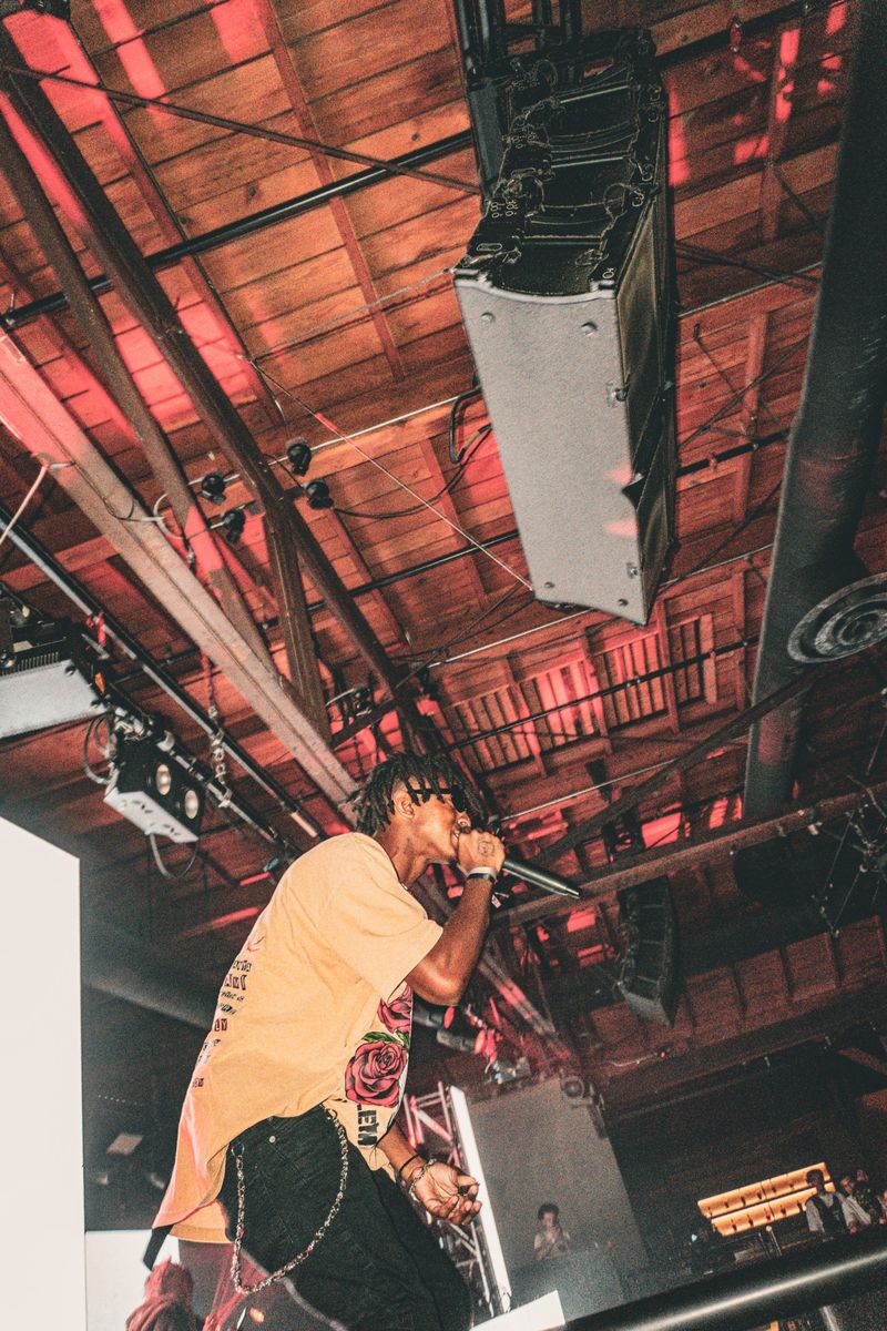 HARLEM on the mic under the Warehouse 1720 rafters
