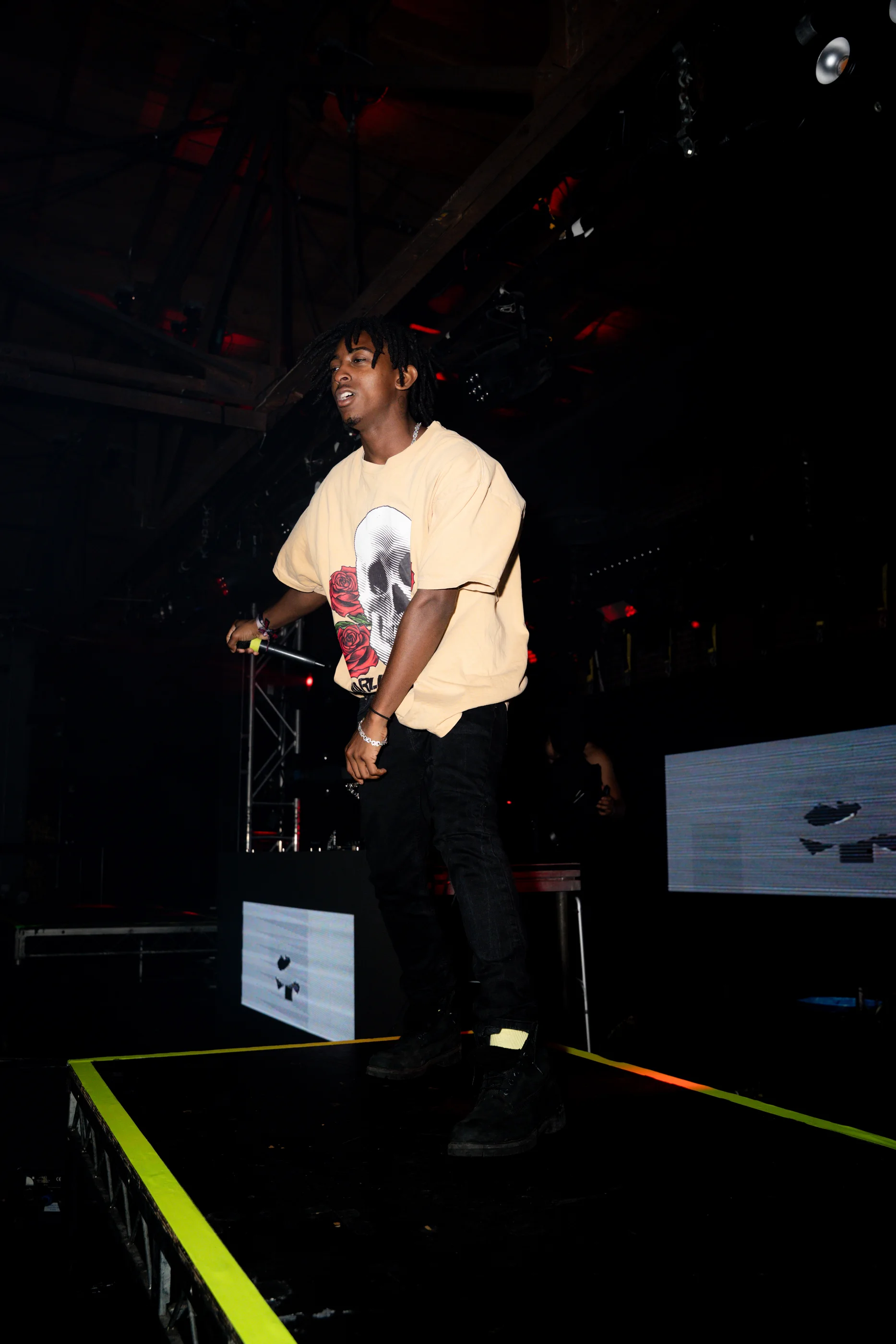 HARLEM at the edge of the stage in a skull graphic tee during the LUCKI show at Venue 1720