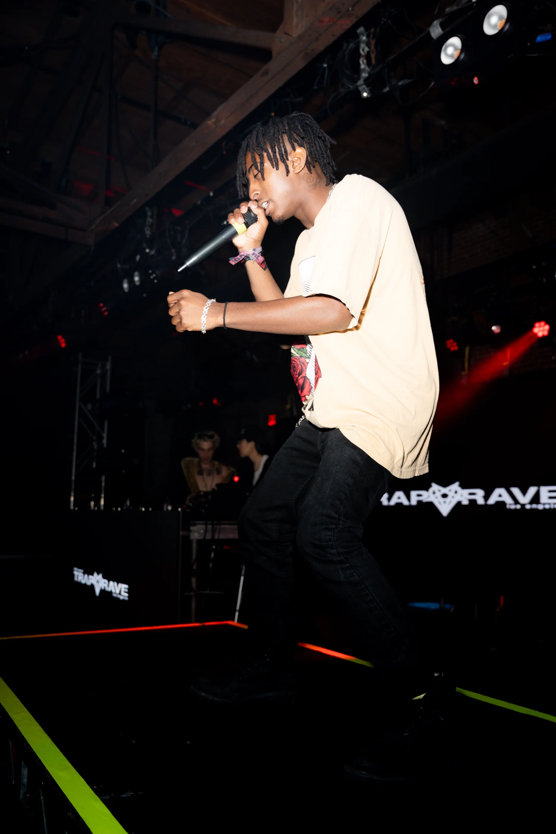 HARLEM rapping in a skull graphic tee during the LUCKI show at Venue 1720